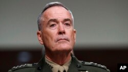 FILE - Joint Chiefs Chairman Gen. Joseph Dunford on Capitol Hill in Washington, June 13, 2017. 