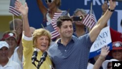 Republican vice-presidential candidate Paul Ryan and his mother Betty Ryan Douglas wave to supporters at a campaign rally in The Villages, Fla., Aug. 18, 2012. 