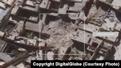 Imágenes de satélite de la ONU muestran casas destruídas en el distrito Al-Qasileh de Alepo, Siria.