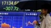 Asian Stocks Fall as Trump Rises in Polls