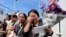 Relatives of the victims of the ferry that sank on June 18 weep during a prayer on a ship on Lake Toba, North Sumatra, Indonesia, July 3, 2018. 