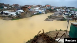 The Kutupalong refugee camp is seen after a storm, in Cox's Bazar, Bangladesh June 10, 2018, in this image obtained from social media. Picture taken June 10, 2018. (K. Marton/Save the Children/via Reuters)