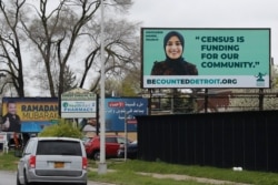 In this Thursday, April 30, 2020 photo, a billboard highlighting the 2020 Census is seen in Dearborn, Mich. The Arab American community checks many boxes that census and nonprofit officials say are hallmarks of the hardest-to-count communities:…