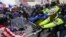 FILE - In this Jan. 6, 2021, photo, rioters try to break through a police barrier at the Capitol in Washington.
