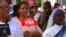 FILE - Roman Catholics protest the legalization of abortion, bearing "For life" signs in Santo Domingo, Dominican Republic, Dec. 9, 2014. This week, after pressure from church groups, the country's high court reinstated a ban on abortion in all cases.