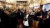 The Rev. Sandy Drayton reacts during a prayer vigil held at the African Methodist Episcopal Church in Charleston, South Carolina, June 18, 2015. 