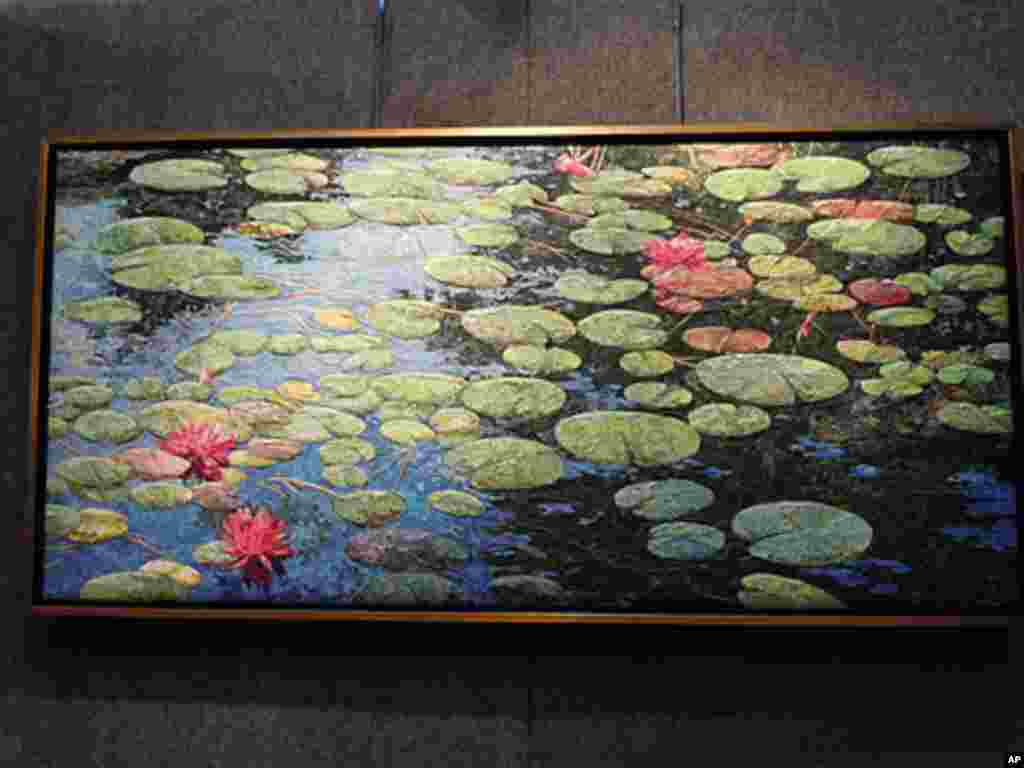 'Water Lillies' is a fabric collage made by artist Laura Breitman of Warwick, New York.