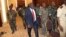 Michel Djotodia, center, rebel leader who declared himself president, arrives for meetings with government armed forces, Bangui, Central African Republic, March 28, 2013.