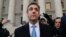 FILE - Michael Cohen walks out of federal court Nov. 29, 2018, in New York, after pleading guilty to lying to Congress about work he did on an aborted project to build a Trump Tower in Russia. 