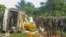 Congolese Defense Forces soldiers inspect the scene of an attack near the town of Oicha, 30 kms (20 miles) from Beni, Democratic Republic of Congo, July 23, 2021.