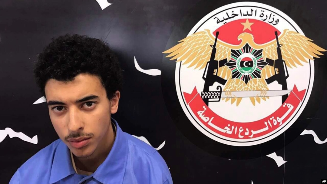 Hashim Ramadan Abedi appears inside the Tripoli-based Special Deterrent anti-terrorism force unit after his arrest on Tuesday for alleged links to the Islamic State extremist group, May 24, 2017.