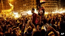 Egyptians gather to protest ongoing military rule in Tahrir Square in Cairo, Friday, June 15, 2012.