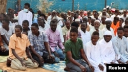 FILE - Sudanese refugees attend Friday prayers at the Gorom Refugee camp hosting Sudanese refugees who fled recent fighting, near Juba, in South Sudan, January 26, 2024.