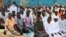 FILE - Sudanese refugees attend Friday prayers at the Gorom Refugee camp hosting Sudanese refugees who fled recent fighting, near Juba, in South Sudan, January 26, 2024.