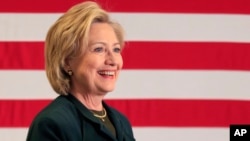 Democratic presidential candidate Hillary Rodham Clinton arrives at a town hall meeting at White Mountain Community College, October 29, 2015, in Berlin, N.H.