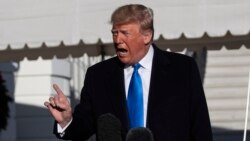 FILE - President Donald Trump speaks with reporters on the South Lawn of the White House, in Washington, Dec. 7, 2019.