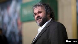 FILE - Writer, producer and director Peter Jackson poses at the premiere of "The Hobbit: The Battle of the Five Armies" at Dolby theatre in Hollywood, California, Dec. 9, 2014.