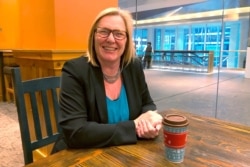 FILE - GOP congressional candidate Michelle Fischbach discusses Minnesota's 7th District race at a coffee shop in Minneapolis, Nov. 22, 2019.