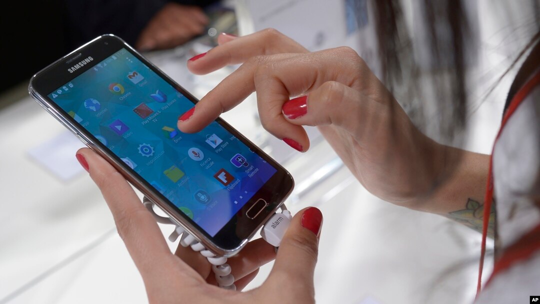 FILE - the Samsung Galaxy S5 is displayed at the Mobile World Congress in Barcelona, Spain, Tuesday, Feb. 25, 2014. 
