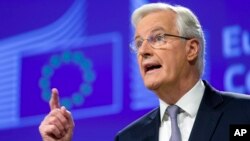 Michel Barnier, Chief Negotiator for the Preparation and Conduct of the Negotiations with the United Kingdom under Article 50 of the Treaty of the European Union, speaks during a media conference at EU headquarters in Brussels, Dec. 6, 2016.