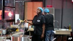 FILE - Chef, Hilda Baci, cooked to establish a new Guinness world record , for the "longest cooking marathon". The 97-hour cook-a-thon in Lagos, Nigeria. Saturday, May. 13, 2023. 