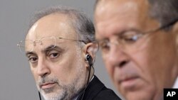 Iranian Foreign Minister Ali Akbar Salehi, left, looks on Russian Foreign Minister Sergei Lavrov during a news conference after their meeting in Moscow, Russia, August 17, 2011