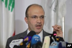 Lebanese Health Minister Hassan Hamad speaks during a news conference, in Beirut, Lebanon, Feb. 21, 2020.