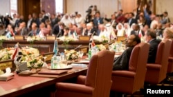 Syria's chair is seen empty at the preparatory meeting of Arab Foreign Ministers in Kuwait City, March 23, 2014.