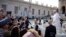 Pope Francis leaves at the end of his weekly general audience, in St. Peter's square, at the Vatican, Nov. 21, 2018.