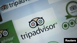 The logo for a travel website company TripAdvisor Inc is shown on a computer screen in this illustration photo in Encinitas, California May 3, 2016. REUTERS/Mike Blake/File Photo