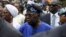 Presidential candidate Bola Ahmed Tinubu arrives at a polling station before casting his ballot in Ikeja, Lagos, Nigeria Feb. 25, 2023.