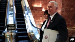 Vice President-elect Mike Pence and his wife Karen arrives at Trump Tower, Nov. 15, 2016, in New York. 