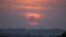 Sunce zalazi iza grada Gaze 9. novembra 2023.