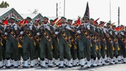 FILE - Members of Iran's Islamic Revolutionary Guard Corps (IRGC) march in the capital Tehran in this handout photo provided by the Iranian presidency on Sept. 22, 2019.