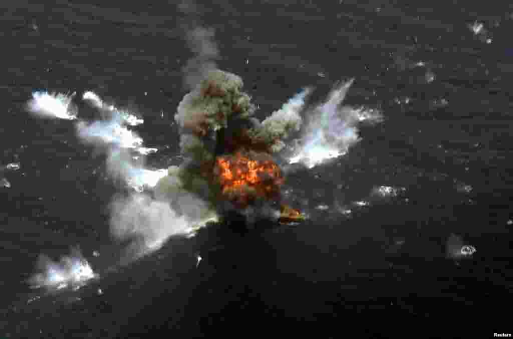 An explosion is seen after a new Iranian locally made cruise missile was fired during war games in the northern Indian Ocean and near the entrance to the Gulf, Iran, June 17, 2020.