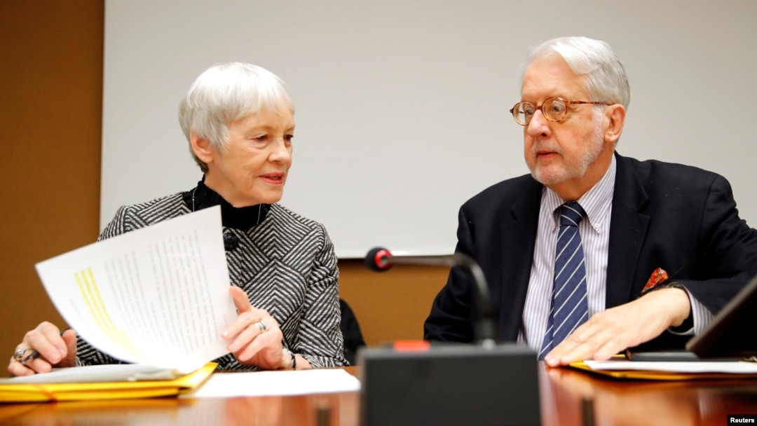 Paulo Pinheiro, Chairperson of the Commission of Inquiry on Syria, arrives with Karen Abuzayd, member of the Commission before the launch of their report on sexual and gender-based violence in Syria at the UN office in Geneva, March 15, 2018. 