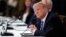 President Donald Trump listens during a "National Dialogue on Safely Reopening America's Schools" event in the East Room of the White House, July 7, 2020.