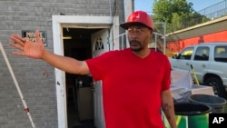 Will Pitts discusses on Wednesday, June 3, 2020, a recent police shooting in Louisville, Ky. Pitts said he witnessed the shooting and is standing near the door where David McAtee was shot by officers.