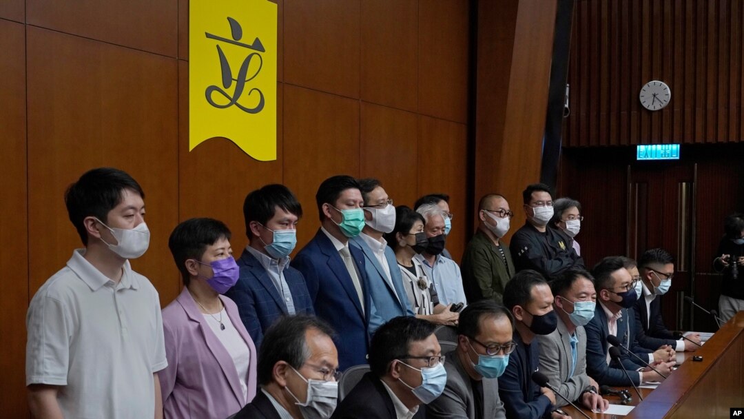 Hong Kong's pro-democracy legislators said at a press conference at the Legislative Council in Hong Kong, Nov. 9, 2020, that they would resign en masse if Beijing disqualifies any of them.