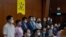 Hong Kong's pro-democracy legislators said at a press conference at the Legislative Council in Hong Kong, Nov. 9, 2020, that they would resign en masse if Beijing disqualifies any of them. 