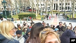 Food activist Gianni Ortiz joined with others to protest the Monsanto Company's legal actions against organic small farms, January 31, 2012.