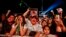 Spectators chant "Justice" in Spanish during a concert by female performers on the eve of International Women's Day, in the Zocalo in Mexico City, March 7, 2020.
