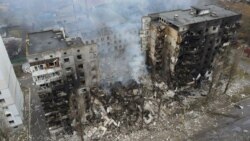 An aerial view shows a residential building destroyed by shelling, as Russia's invasion of Ukraine continues, in the settlement of Borodyanka in the Kyiv region, Ukraine March 3, 2022.