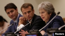 British Prime Minister Theresa May speaks during a session on girls' education on the sidelines of the General Assembly at U.N. headquarters in New York, Sept. 25, 2018.