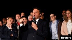FILE - Matteo Renzi speaks at the Democratic Party (PD) headquarters in Rome, Italy, April 30, 2017. 
