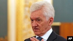 FILE - Russian tycoon Gennady Timchenko is seen prior to a meeting of Russian President Vladimir Putin and Chinese President Xi Jinping with businessmen in the Kremlin in Moscow, Russia, July 4, 2017. 