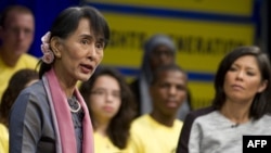 Burma's opposition leader Aung San Suu Kyi speaks during a town hall meeting hosted by Amnesty International in Washington on September 20, 2012. 