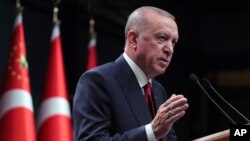 FILE - Turkish President Recep Tayyip Erdogan speaks after a Cabinet meeting, in Ankara, Turkey, Oct. 11, 2021.