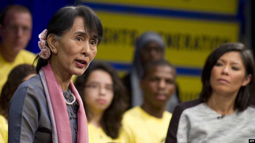 Burma's opposition leader Aung San Suu Kyi speaks during a town hall meeting hosted by Amnesty International in Washington on September 20, 2012. 