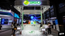 This photo taken on Nov. 6, 2018, shows people visiting a booth of Qihoo 360 at the Light of Internet Expo ahead of the 5th World Internet Conference in Wuzhen. Qihoo 360 is believed to have supported the new Tuber app.